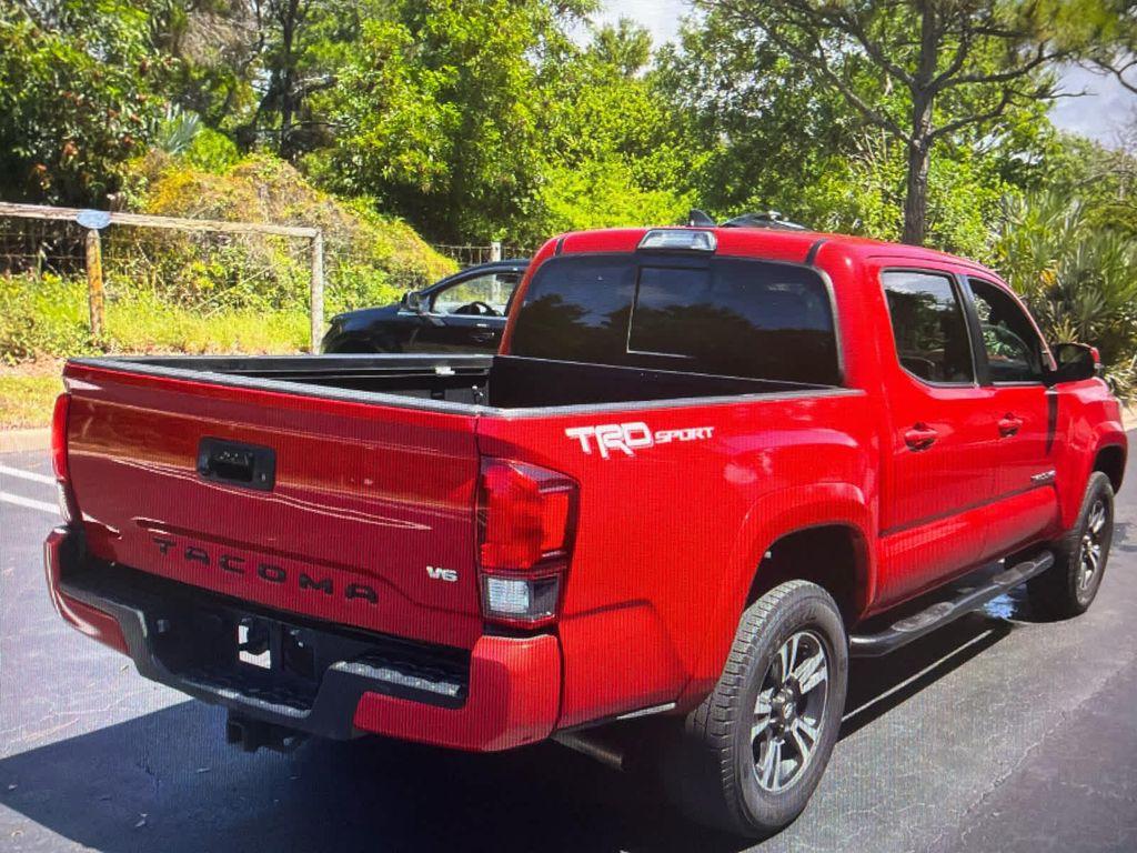 used 2019 Toyota Tacoma car, priced at $30,131