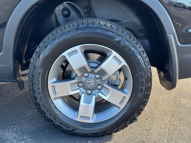 used 2025 Honda Ridgeline car, priced at $39,312