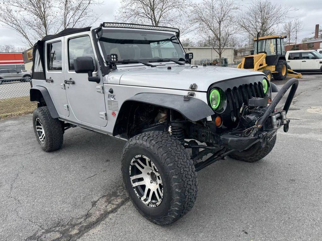 used 2012 Jeep Wrangler Unlimited car, priced at $8,995