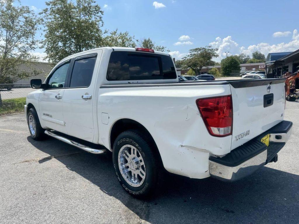 used 2013 Nissan Titan car, priced at $4,995