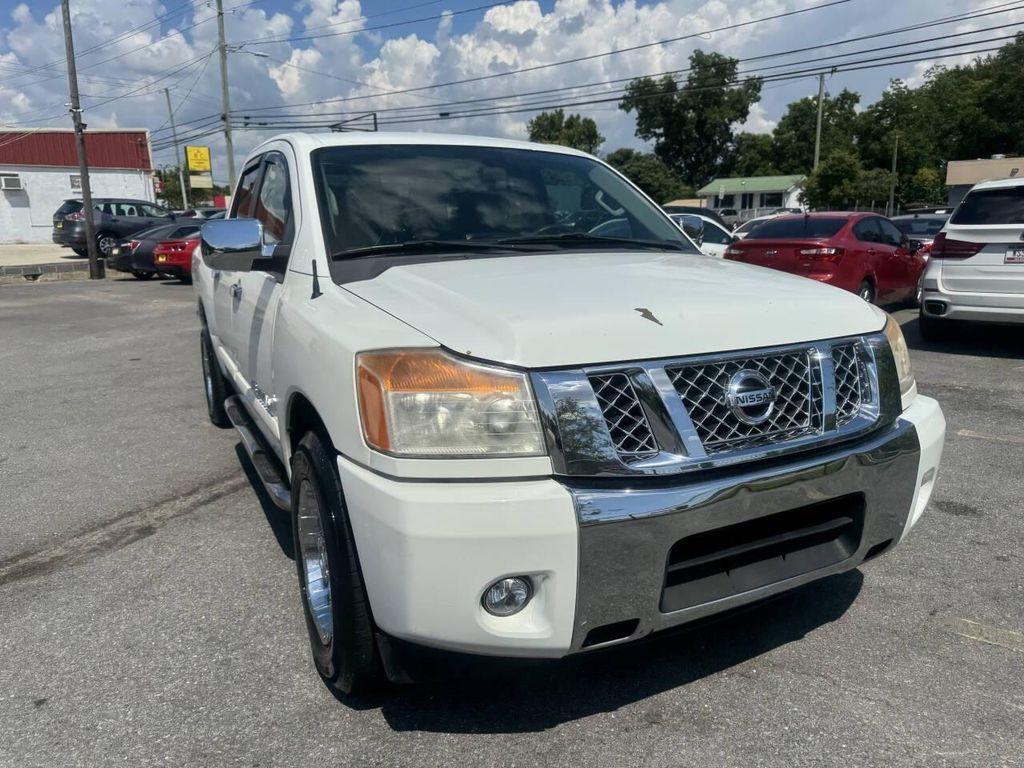 used 2013 Nissan Titan car, priced at $4,995