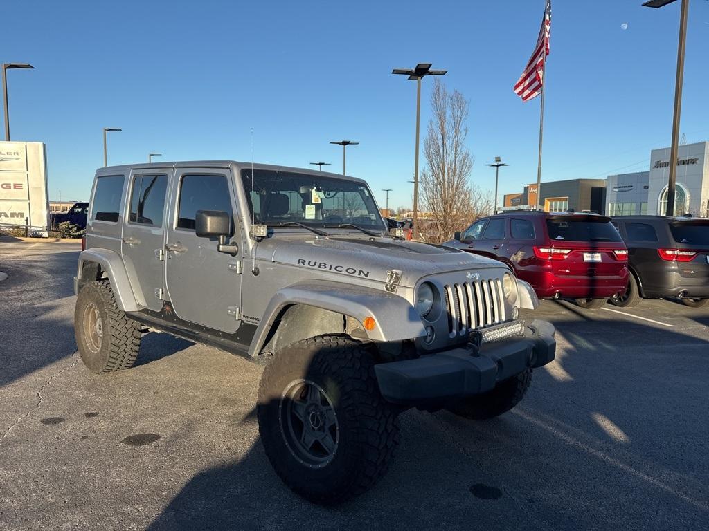 used 2014 Jeep Wrangler Unlimited car, priced at $15,596