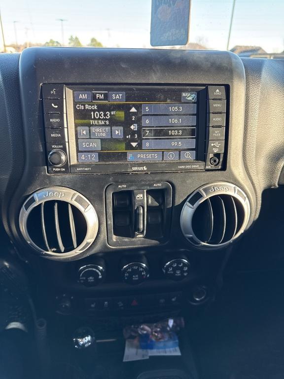used 2014 Jeep Wrangler Unlimited car, priced at $15,596