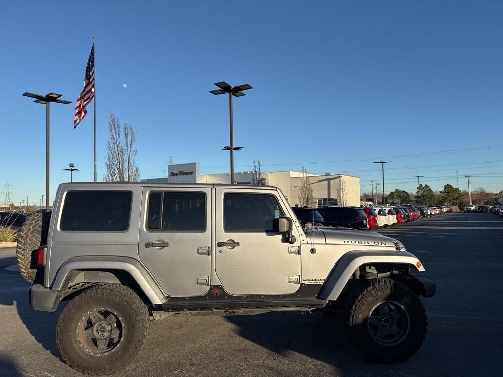 used 2014 Jeep Wrangler Unlimited car, priced at $15,596