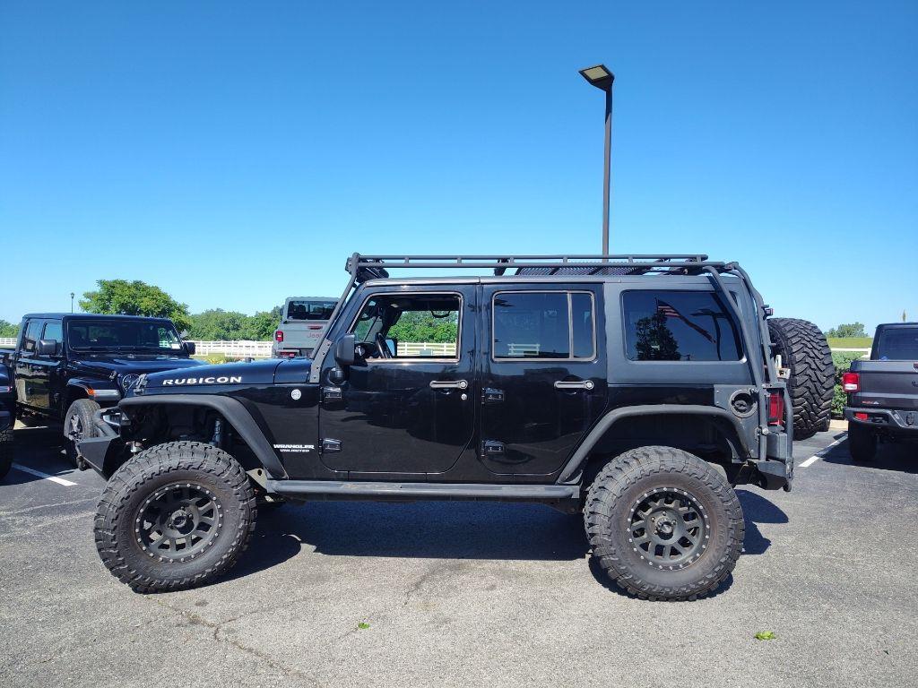 used 2015 Jeep Wrangler Unlimited car, priced at $28,338