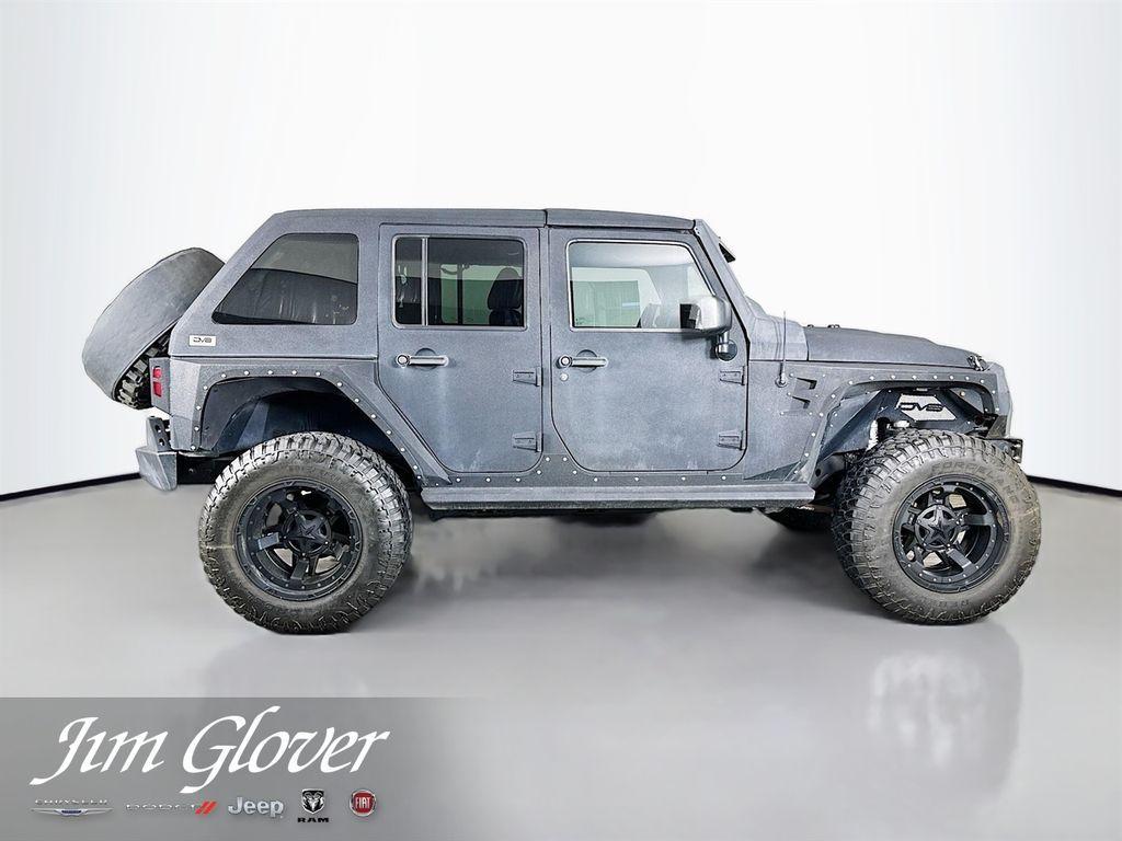 used 2016 Jeep Wrangler Unlimited car, priced at $24,586