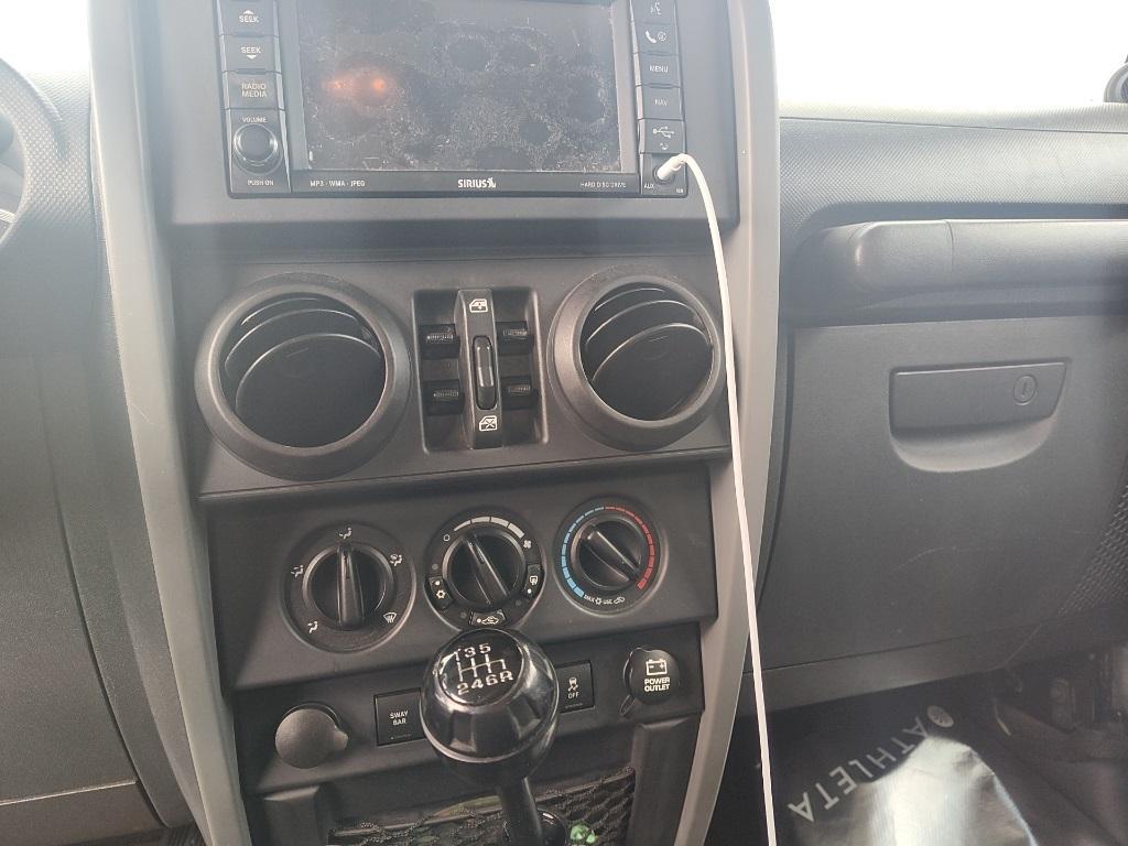 used 2010 Jeep Wrangler Unlimited car, priced at $15,990