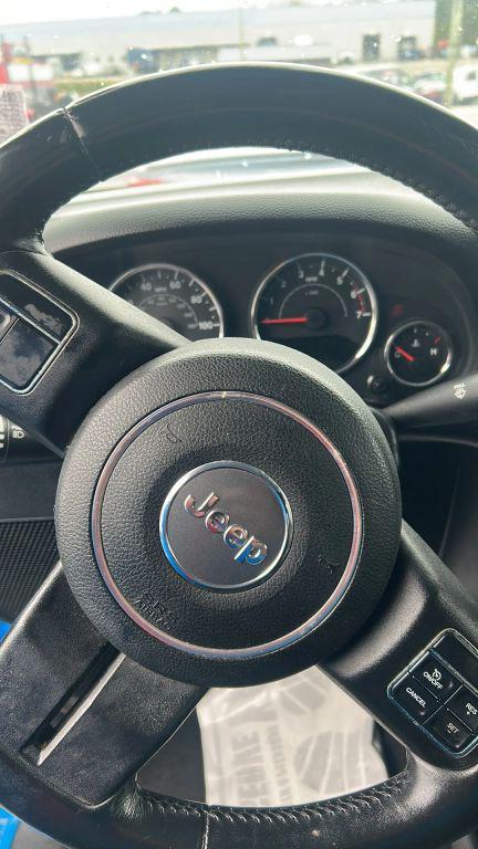 used 2011 Jeep Wrangler Unlimited car, priced at $12,000