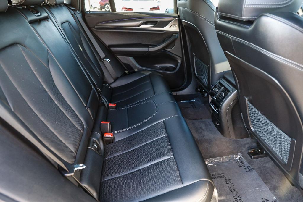 used 2023 BMW X4 car, priced at $52,991