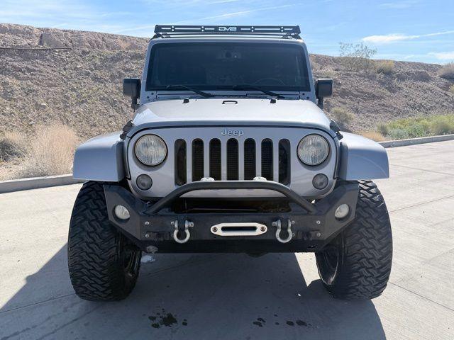 used 2014 Jeep Wrangler Unlimited car, priced at $18,044