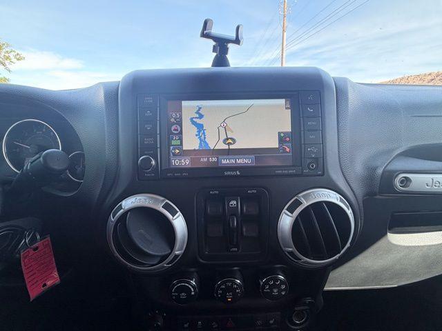 used 2014 Jeep Wrangler Unlimited car, priced at $18,044