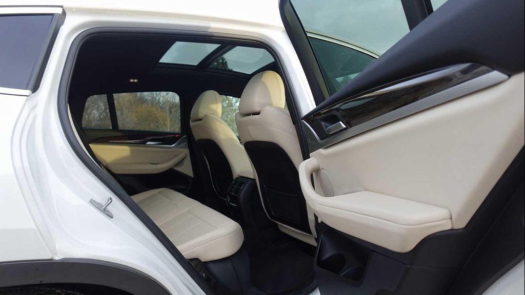 used 2023 BMW X4 car, priced at $35,332