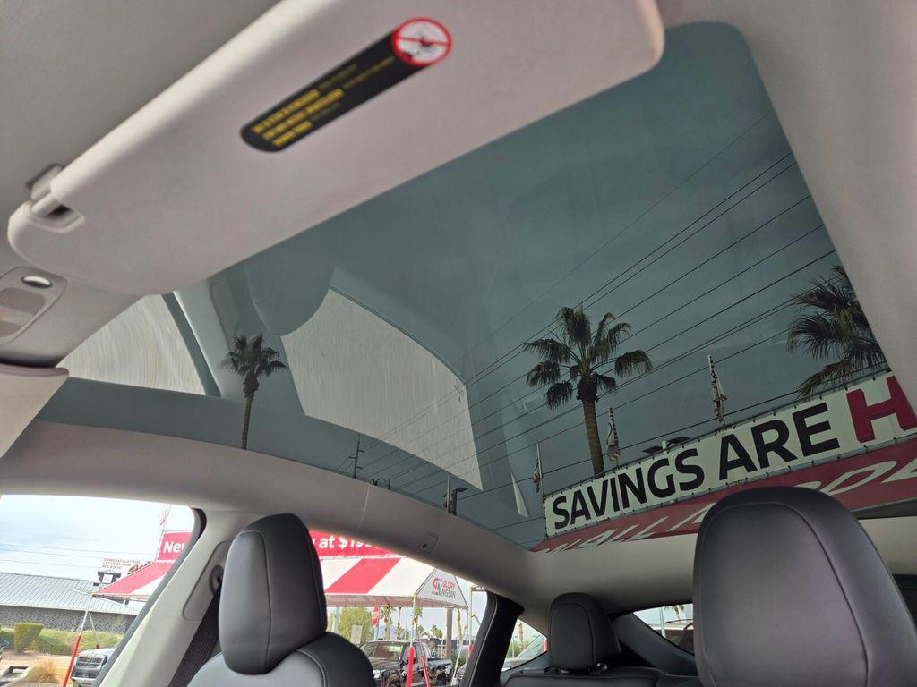 used 2023 Tesla Model Y car, priced at $34,995