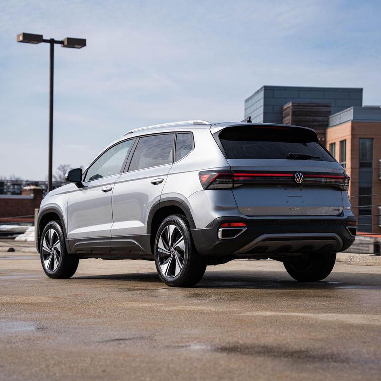 used 2025 Volkswagen Taos car, priced at $22,500