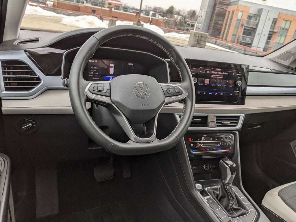 used 2025 Volkswagen Taos car, priced at $23,500