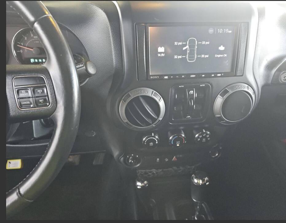 used 2014 Jeep Wrangler Unlimited car, priced at $22,499