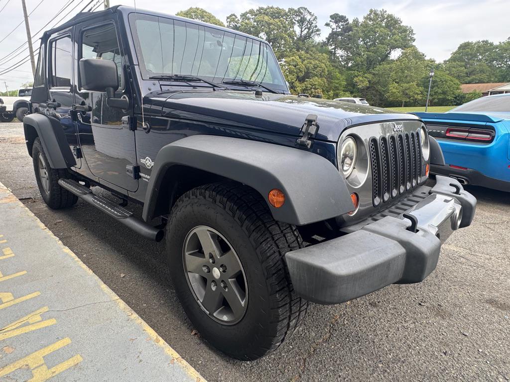 used 2013 Jeep Wrangler Unlimited car, priced at $14,995
