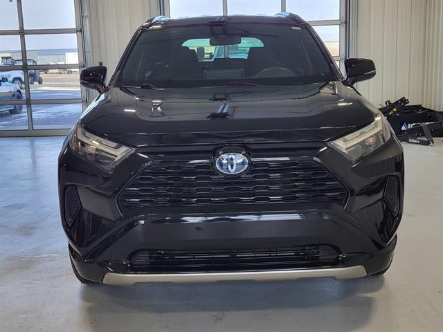 used 2023 Toyota RAV4 Hybrid car, priced at $30,000