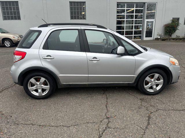 used 2012 Suzuki SX4 car, priced at $3,995