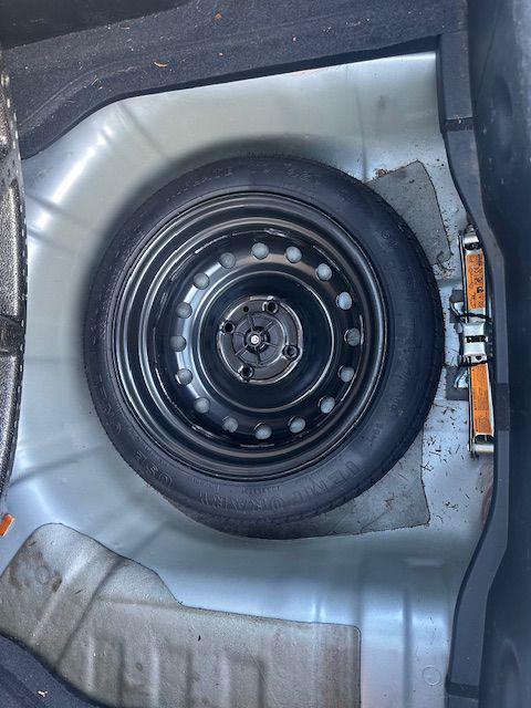 used 2010 Nissan Versa car, priced at $5,500