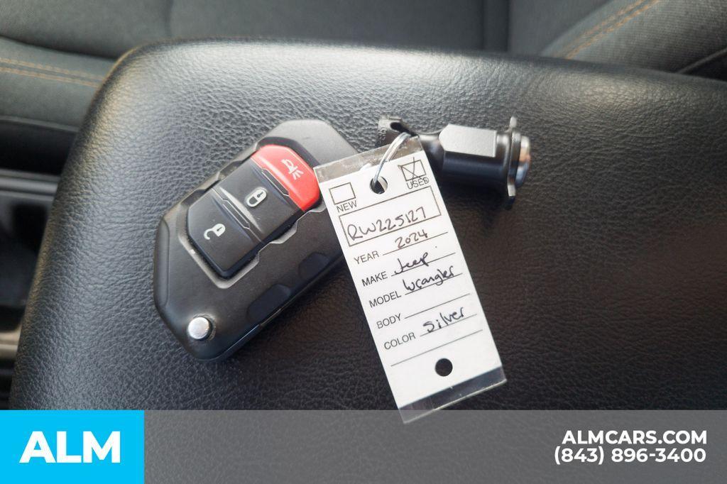used 2024 Jeep Wrangler 4xe car, priced at $28,768