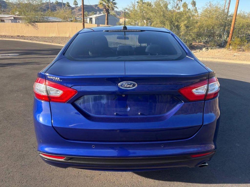 used 2016 Ford Fusion car, priced at $10,495