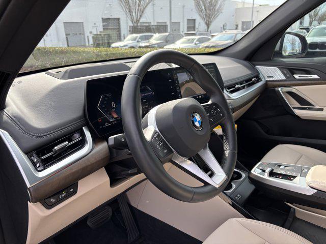used 2025 BMW X1 car, priced at $42,477