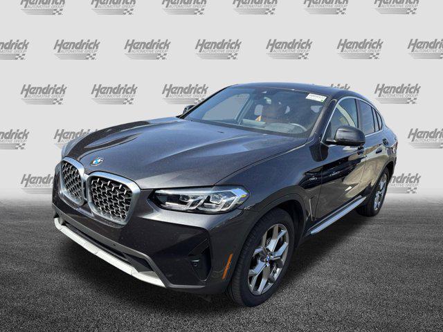 used 2025 BMW X4 car, priced at $48,977