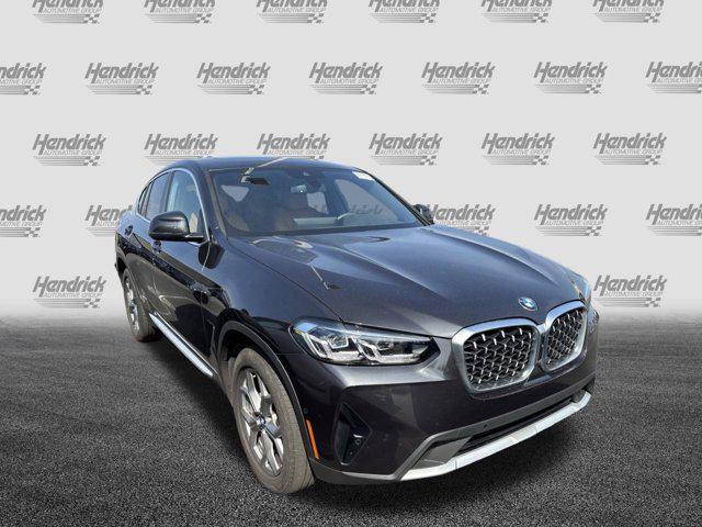 used 2025 BMW X4 car, priced at $48,977