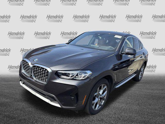 used 2025 BMW X4 car, priced at $48,977