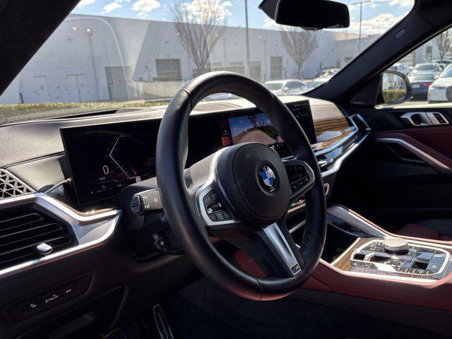used 2026 BMW X6 car, priced at $73,977
