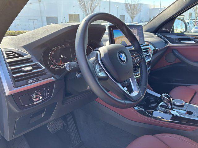 used 2025 BMW X4 car, priced at $48,977