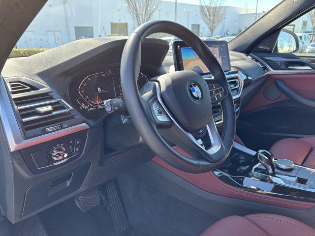 used 2025 BMW X4 car, priced at $48,977