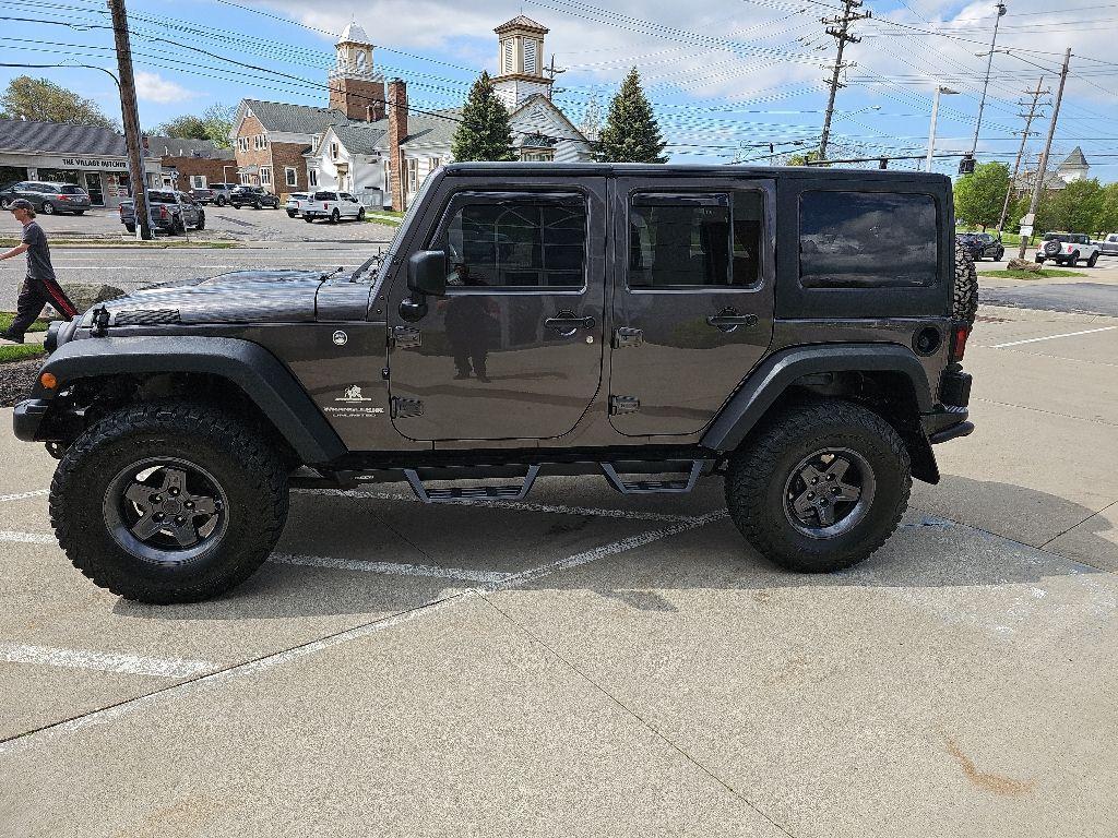 used 2018 Jeep Wrangler JK Unlimited car, priced at $25,981