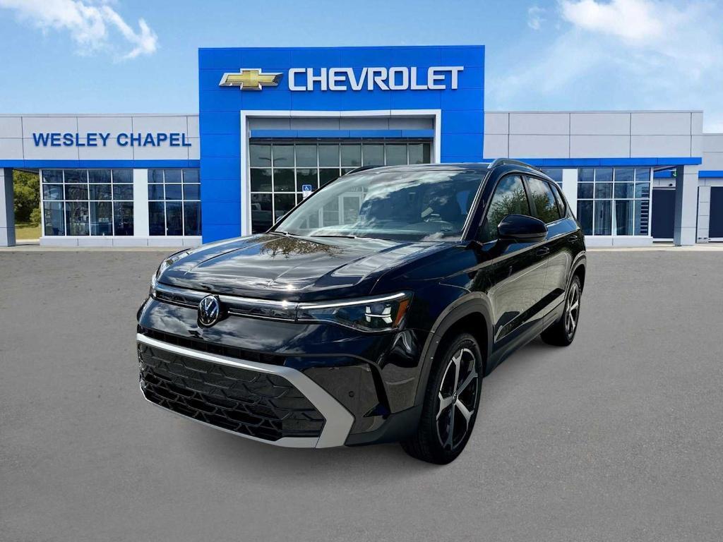 used 2025 Volkswagen Taos car, priced at $23,599