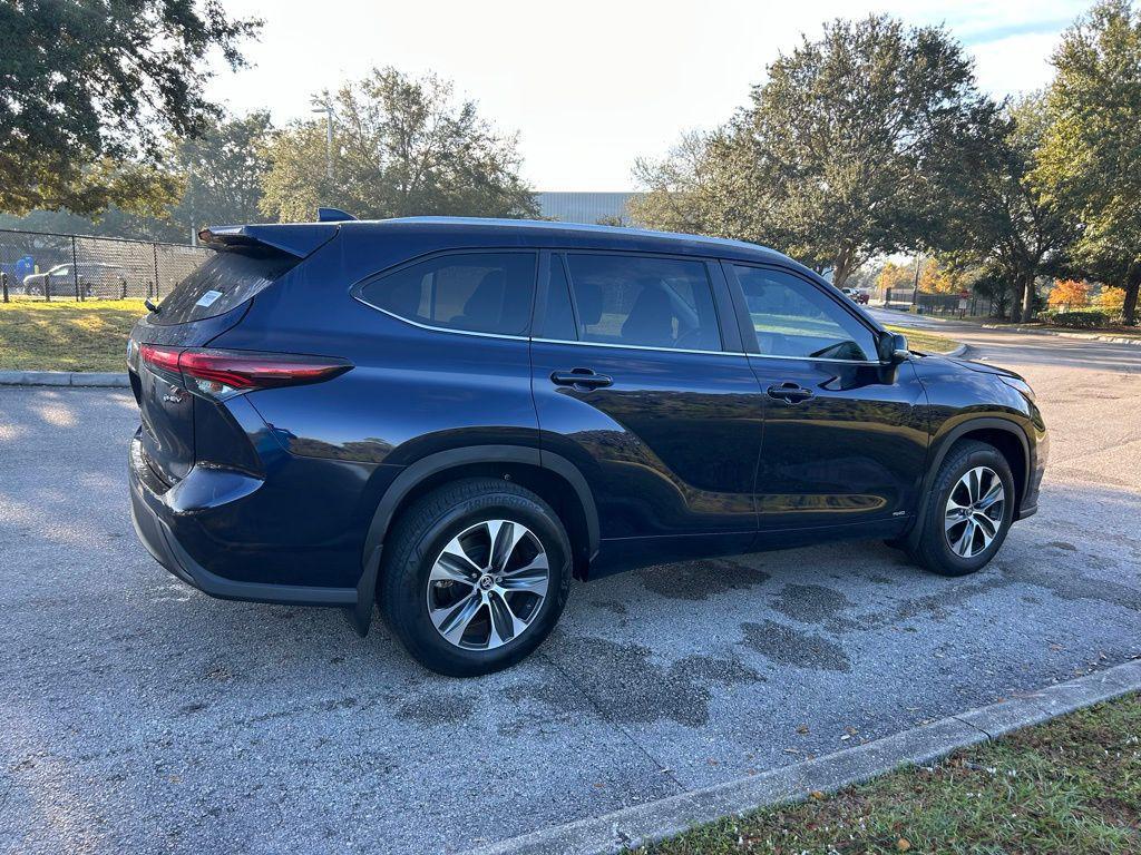 used 2025 Toyota Highlander Hybrid car, priced at $46,337