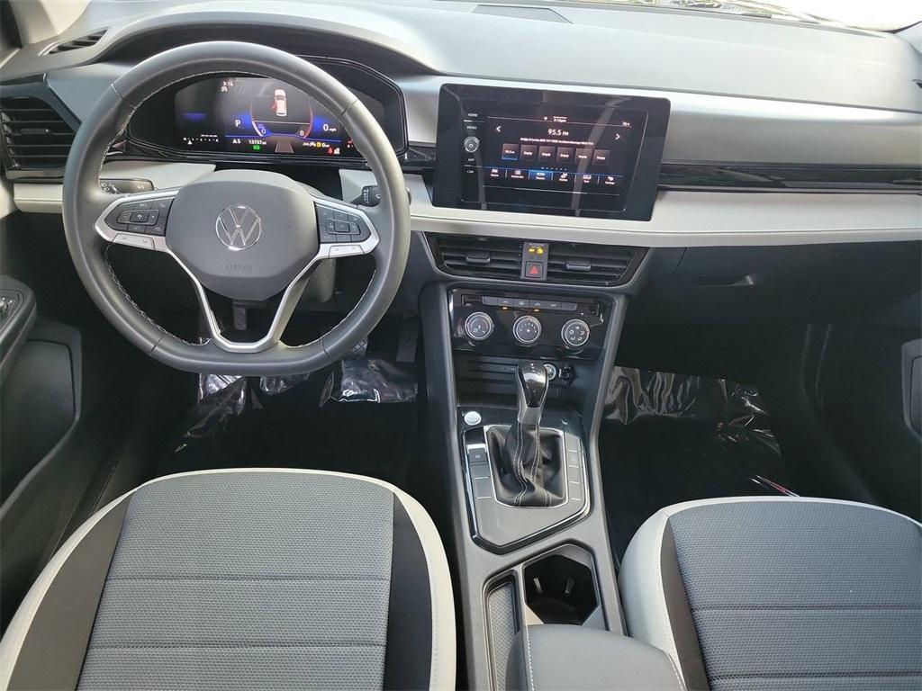 used 2025 Volkswagen Taos car, priced at $21,697