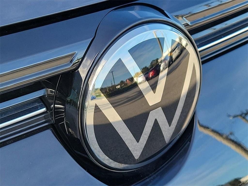 used 2025 Volkswagen Taos car, priced at $21,697