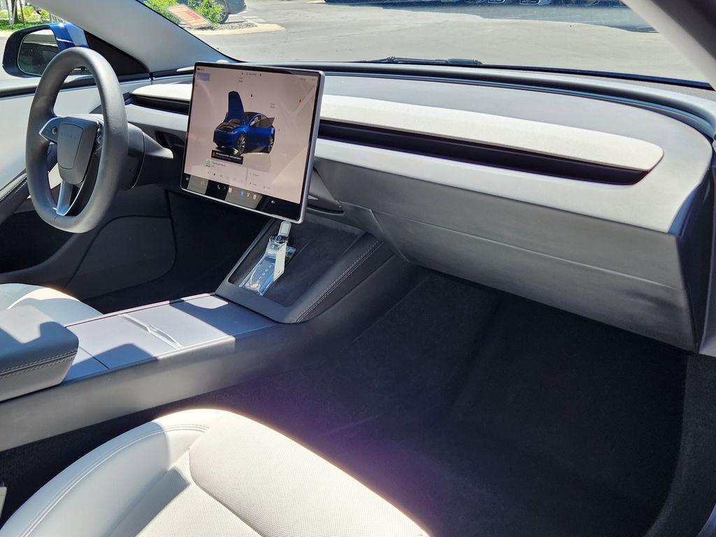 used 2025 Tesla Model 3 car, priced at $38,646