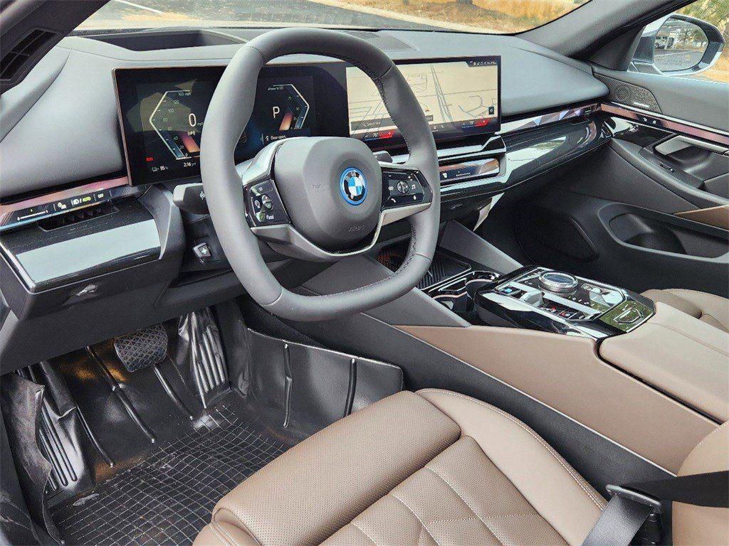 used 2025 BMW i5 car, priced at $58,099