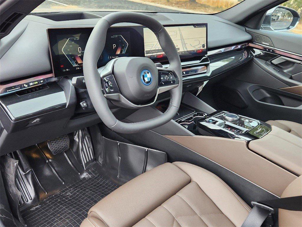 used 2025 BMW i5 car, priced at $59,994