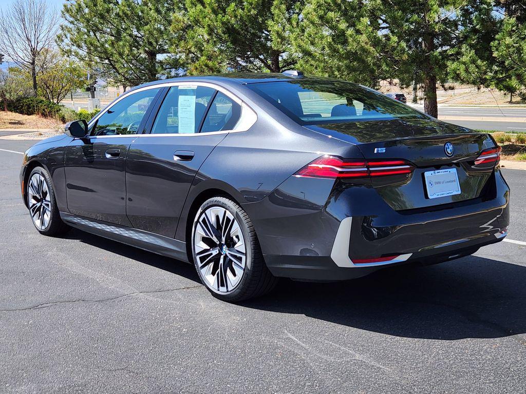 used 2025 BMW i5 car, priced at $58,099