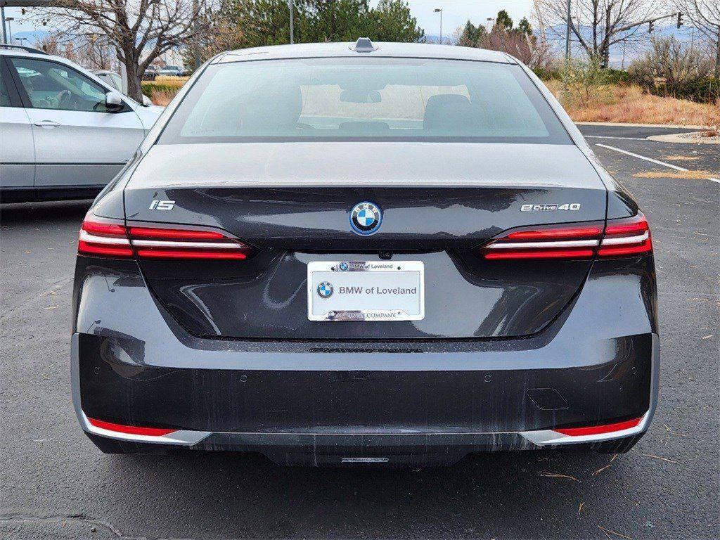 used 2025 BMW i5 car, priced at $58,099