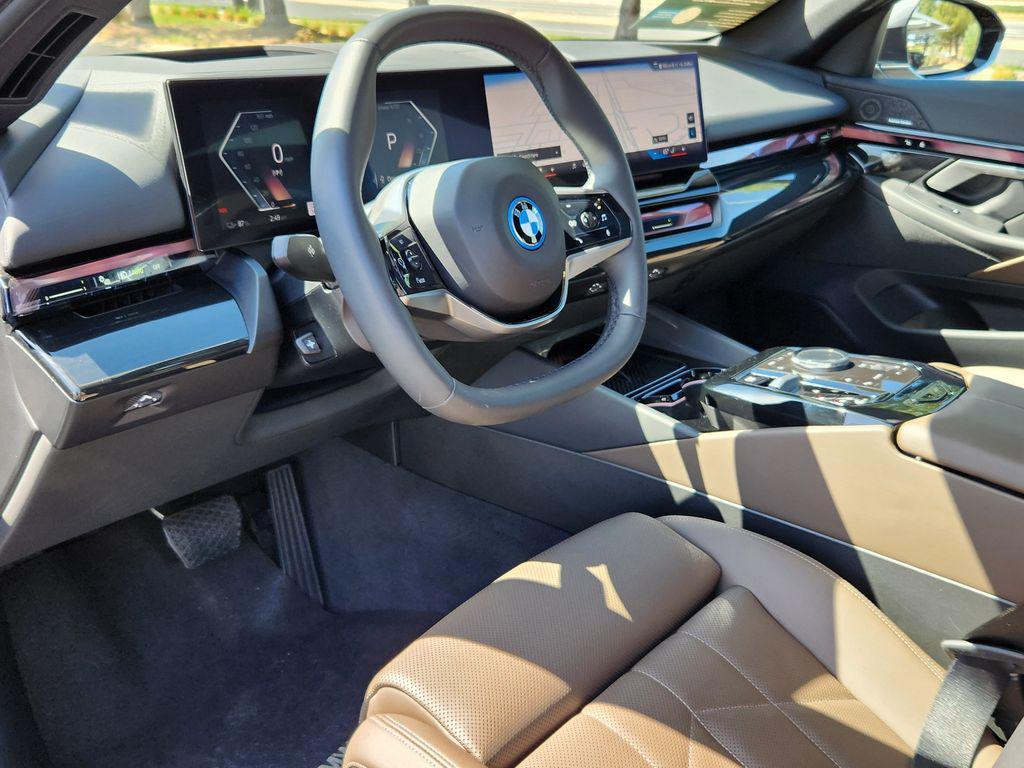 used 2025 BMW i5 car, priced at $58,099