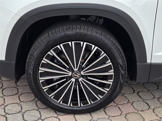 used 2025 Volkswagen Taos car, priced at $25,041