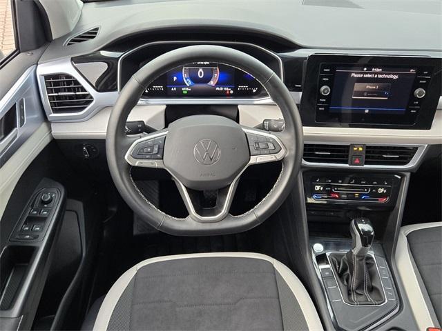 used 2025 Volkswagen Taos car, priced at $25,041