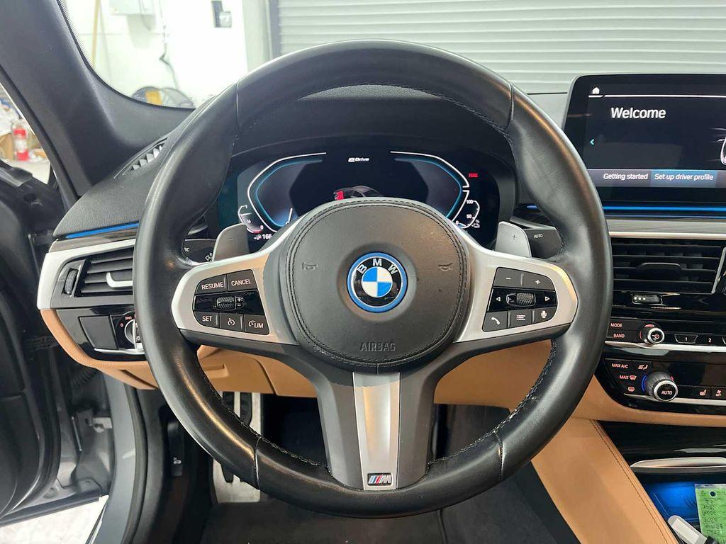 used 2023 BMW 530e car, priced at $34,943