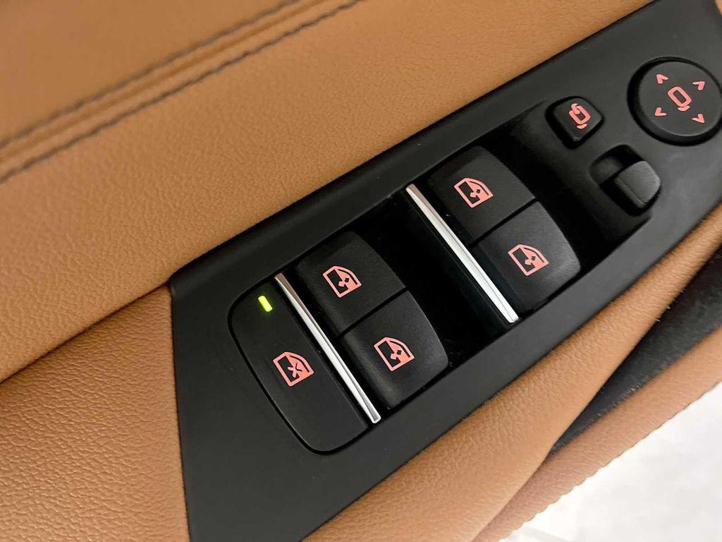 used 2023 BMW 530e car, priced at $34,943