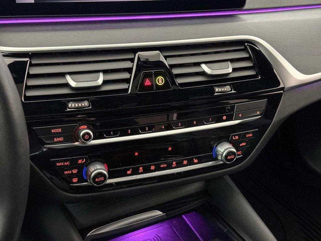 used 2023 BMW 530e car, priced at $35,341