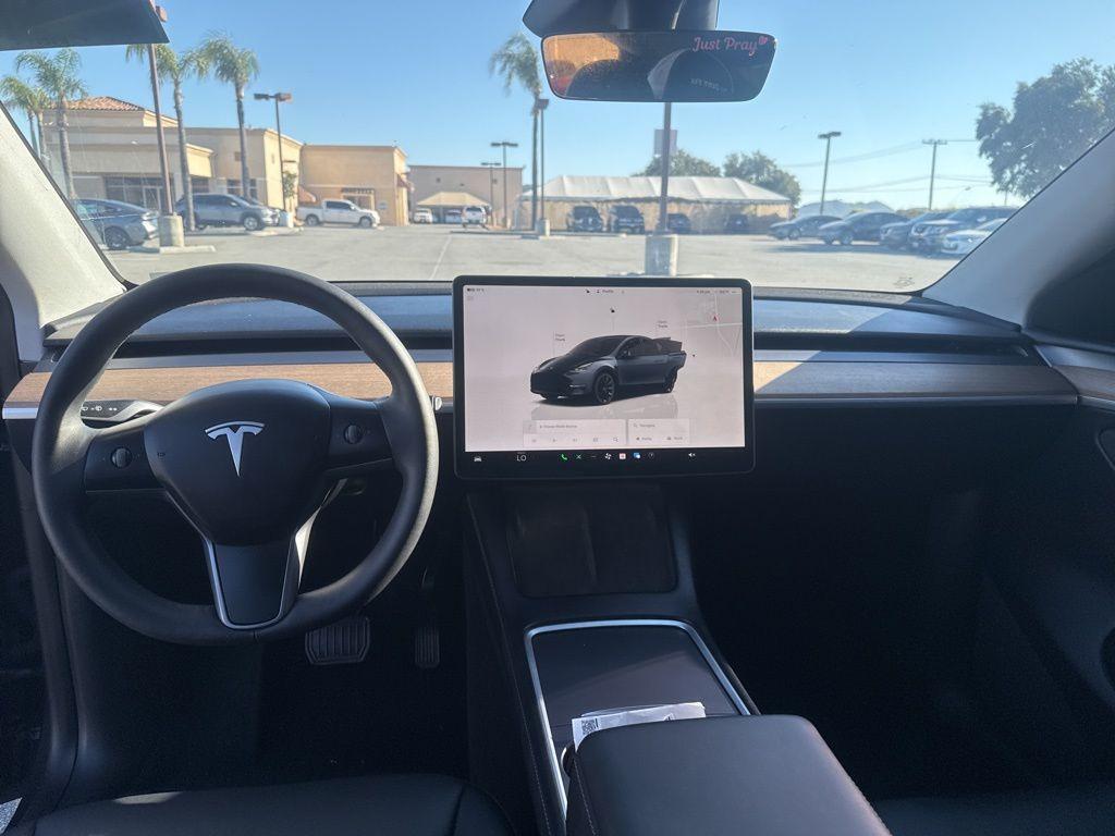 used 2024 Tesla Model Y car, priced at $35,328